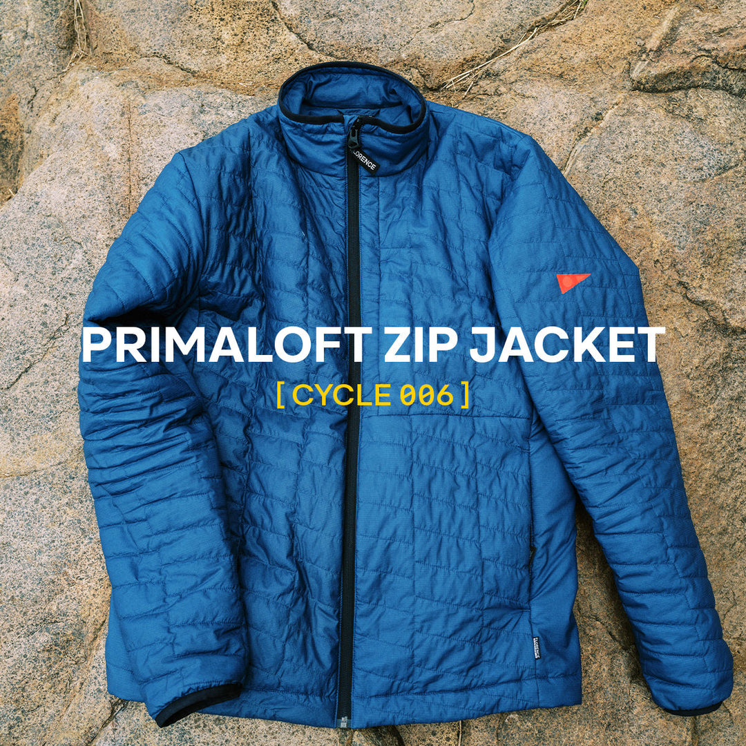 Primaloft Zip Jacket on Rocks