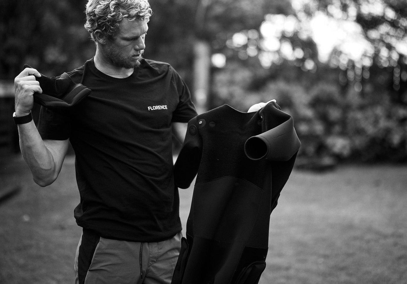 John Florence putting together his Florence Impact Suit before the Eddie Invitational