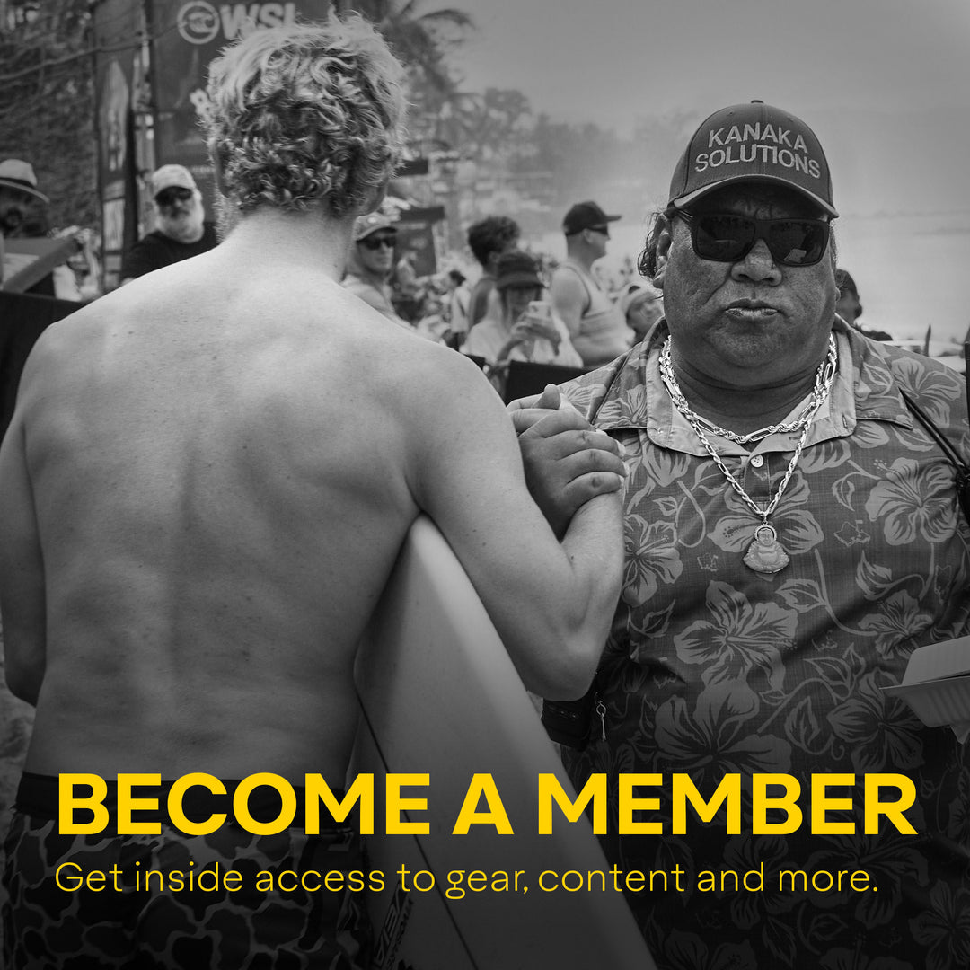 Black and white image of two men engaging in a conversation at an outdoor event, with one man facing away and the other wearing a hat with 'KANAKA SOLUTIONS' written on it. The text on the image reads 'BECOME A MEMBER' with additional details about the membership benefits.